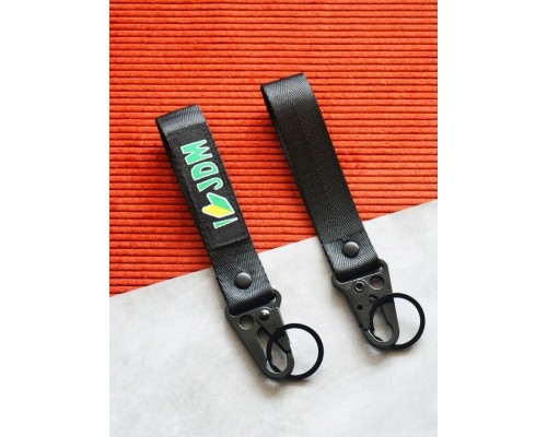 Брелок "JDM" ткань, лента 16*2,5см Брелок "JDM" ткань, лента 16*2,5см
